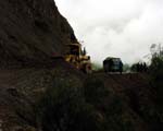 Bulldozer clearing landslide near Ocros; in the rainy season, bus timetables are clearly works of optimism round here