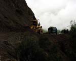 Bulldozer clearing landslide near Ocros; in the rainy season, bus timetables are clearly works of optimism round here